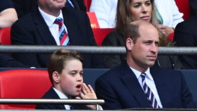 Prince William and Prince George arrive at the match between Manchester City and Manchester United