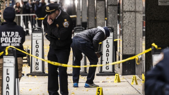 Police at the scene of the killing of UnitedHealth Group executive Brian Thompson in Midtown Manhattan