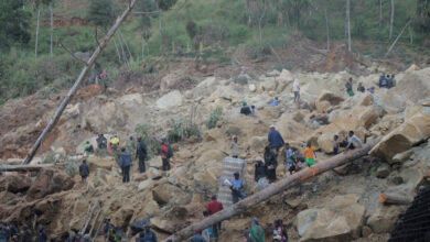 Officials say a landslide in Papua New Guinea has buried 2,000 people