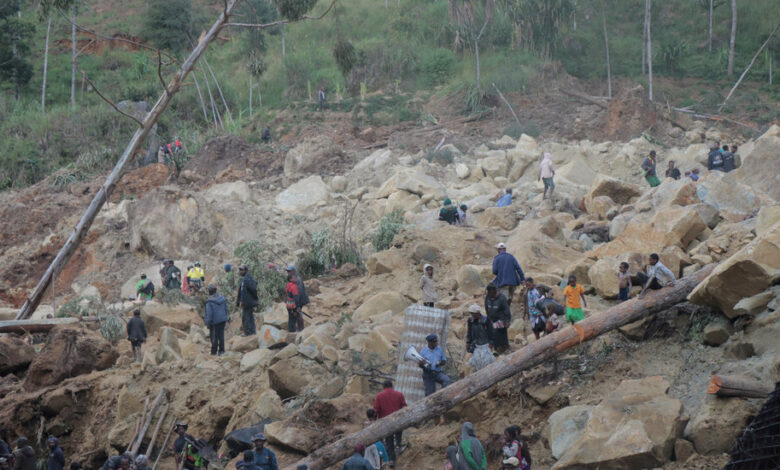 Officials say a landslide in Papua New Guinea has buried 2,000 people