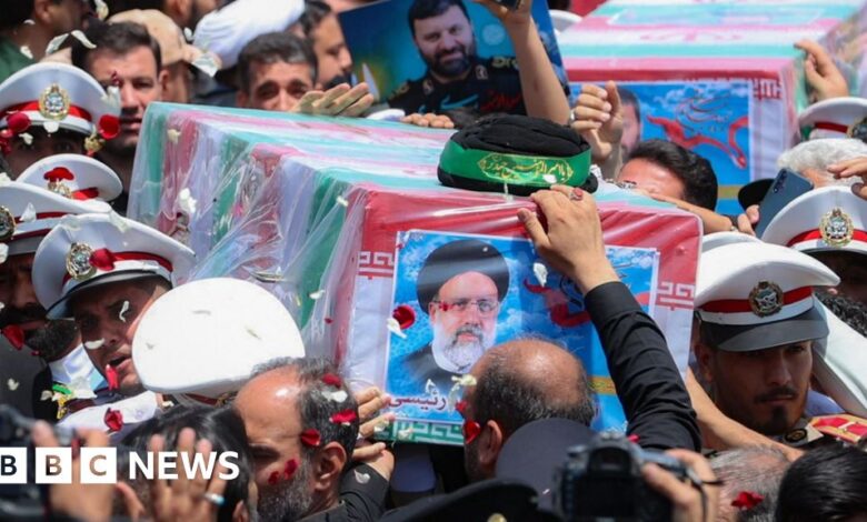 Iran buries the late president at the shrine in Mashhad
