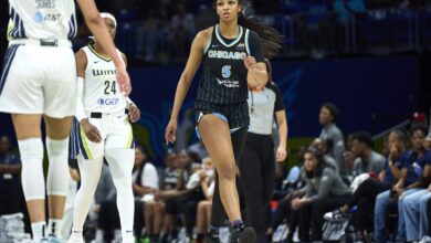 Angel Reese reacts to Alyssa Thomas's flagrant foul