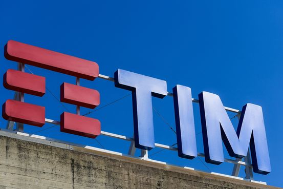 Telecom Italia backed its outlook after earnings rose