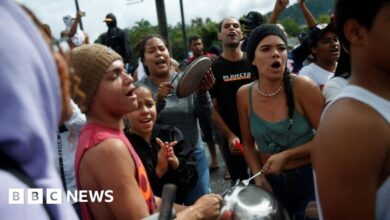 Protesters march toward the presidential palace after Maduro declares victory