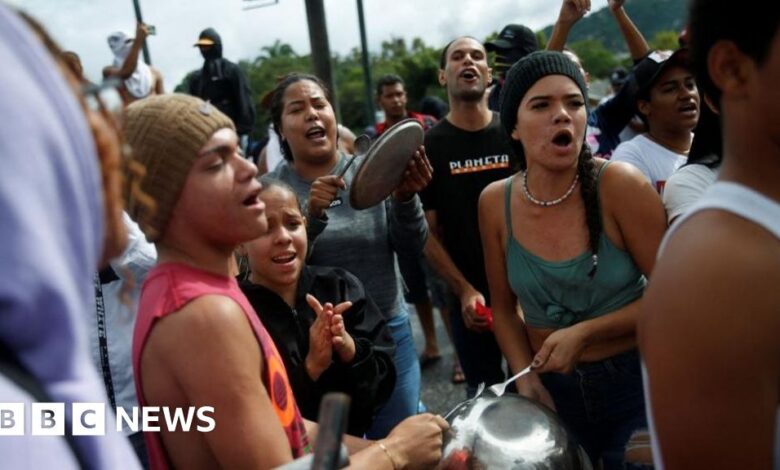 Protesters march toward the presidential palace after Maduro declares victory