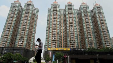 Chinese real estate stocks rose after major cities eased home buying restrictions