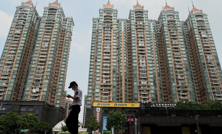 Chinese real estate stocks rose after major cities eased home buying restrictions