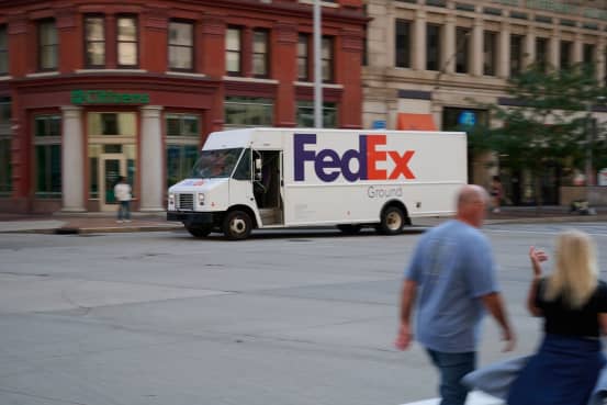 FedEx cuts full-year outlook after posting lower profit and revenue