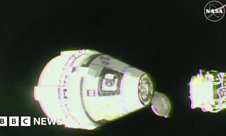 Capsule carrying stranded astronauts returns home without them