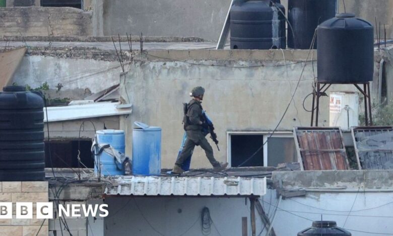 Israel investigates after soldiers filmed throwing dead bodies from roof