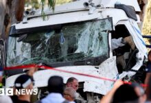 Dozens of people were injured after a truck crashed into a bus station in central Israel