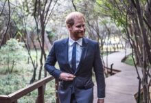 Prince Harry surfs with Kelly Slater at the artificial wave facility