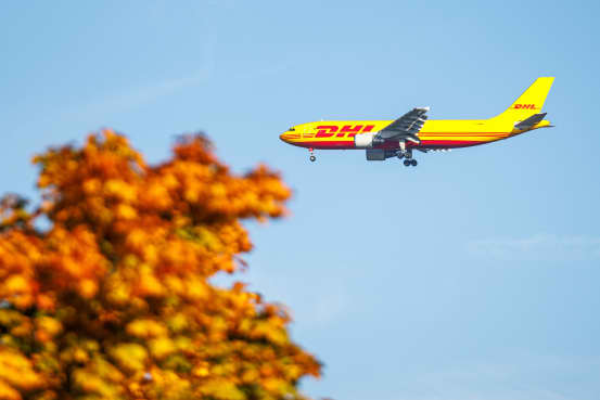 DHL owner's net profit fell due to costs