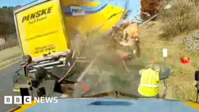 Watch: The moment a worker avoids a collision with a high-speed truck