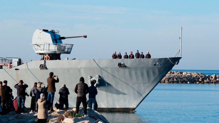 The Italian navy ship Libra arrives at the port of Shengjin, Albania, on Friday, with the second group of migrants