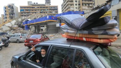 People return with their belongings to their homes in Beirut’s southern suburbs