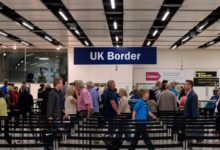 Border Force check the passports of passengers arriving at Gatwick Airport