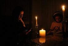 People light candles as power outage crisis hit Tehran