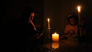 People light candles as power outage crisis hit Tehran