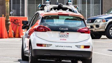 General Motors cuts travel sponsorship, ends Robotaxi plan