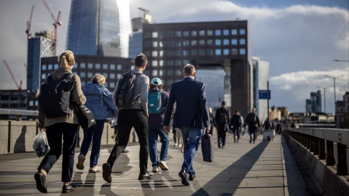 Workers cross London Bridge