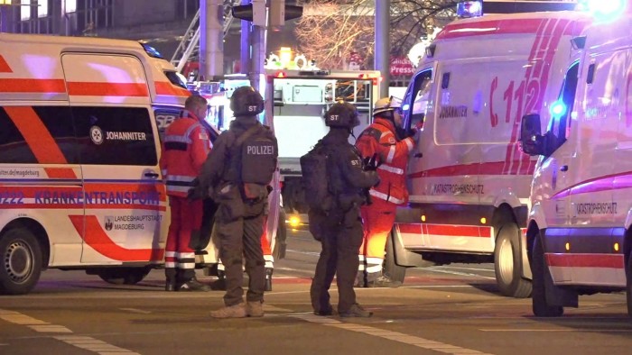 Emergency services at the Christmas market in Magdeburg, eastern Germany, after a car ran into a Christmas market